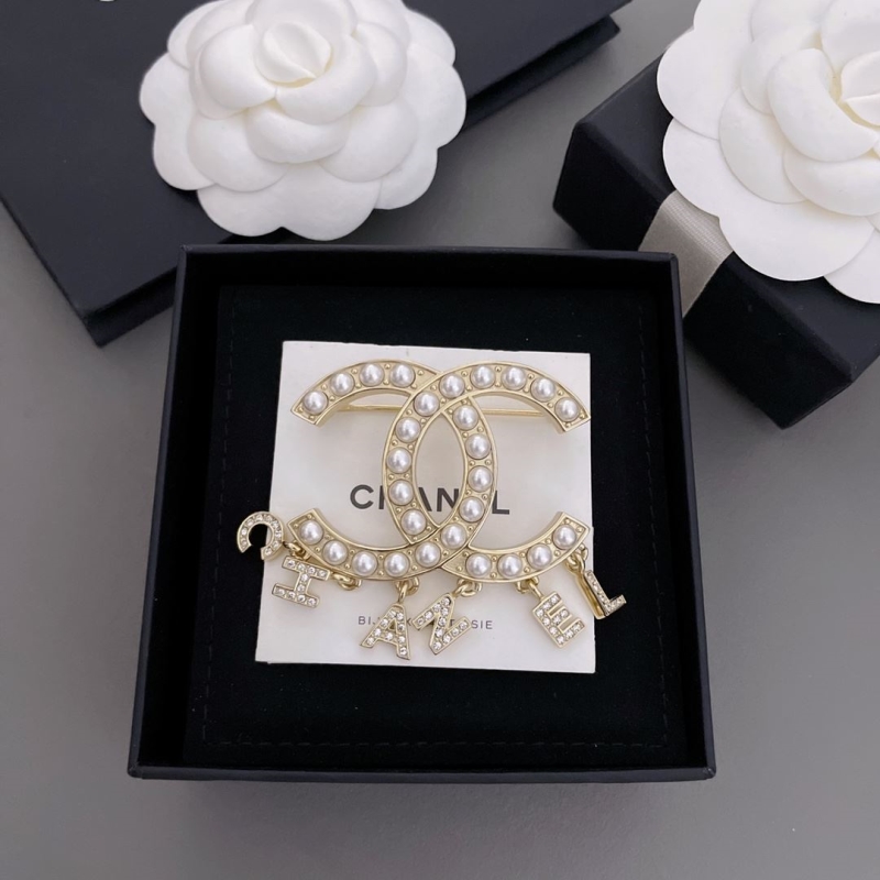 Ch*el brooches